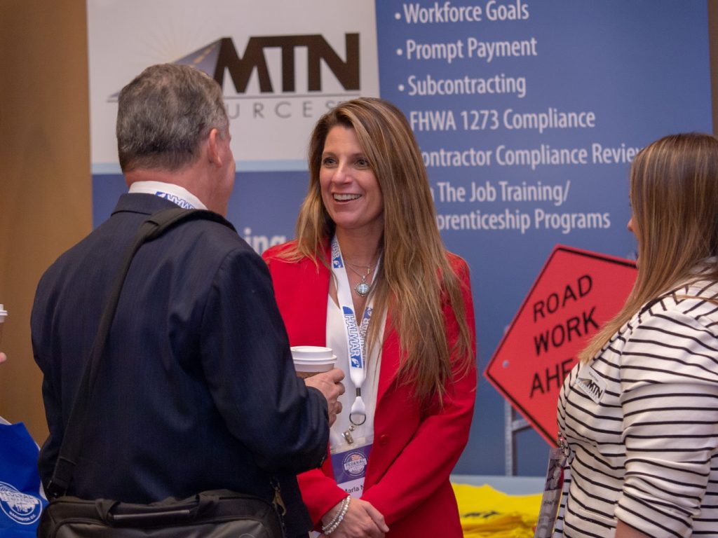networking at an exhibit booth